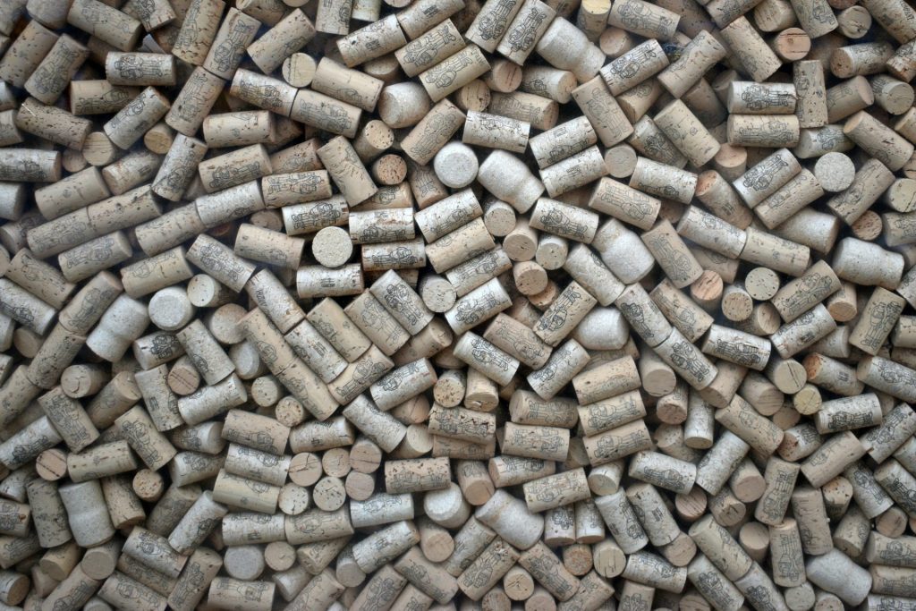 a pile of wine corks sitting next to each other